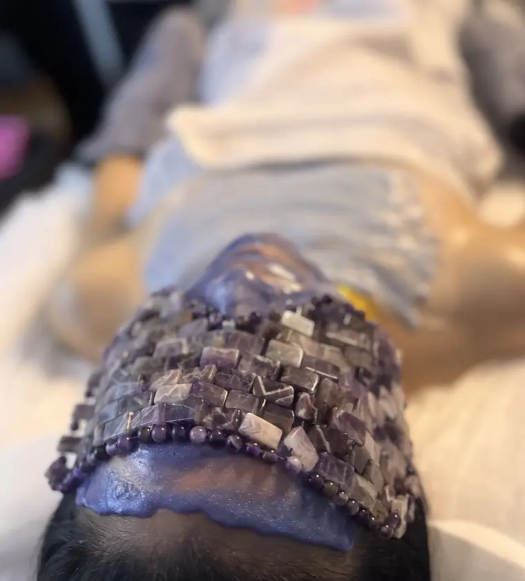 Soft focus view of a crystal mask treatment at Tulum Spa in Mar Vista